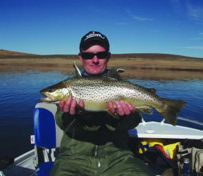 Andrew Heath with a prime 2kg brown caught on the troll in Eucumbene.
